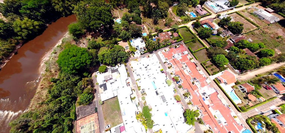 Aerial view of Melgar, Tolima, showing the river, the rooftops and tropical vegetation